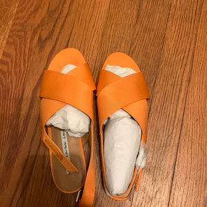 Bright orange sandals